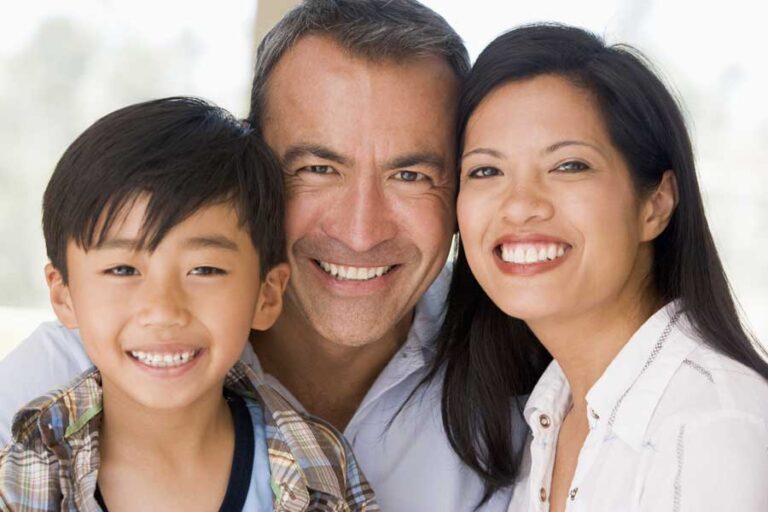 A happy family sharing healthy, confident smiles