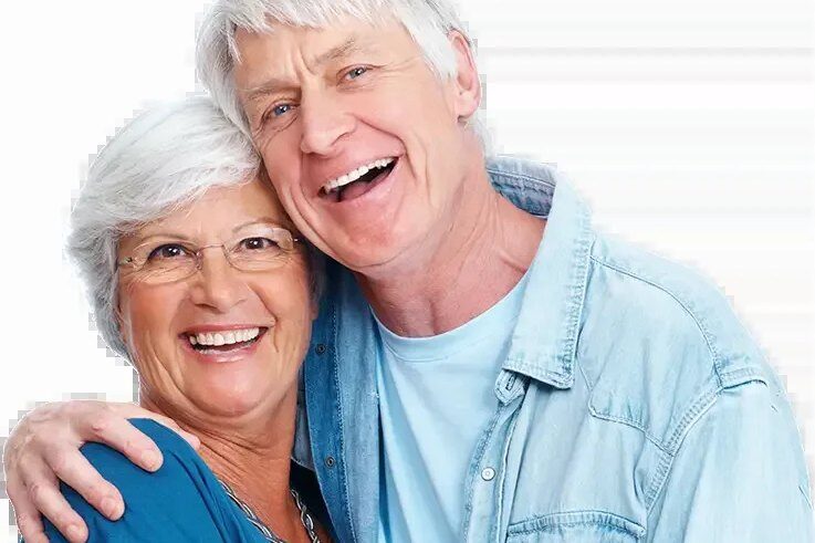 Smiling older couple embracing