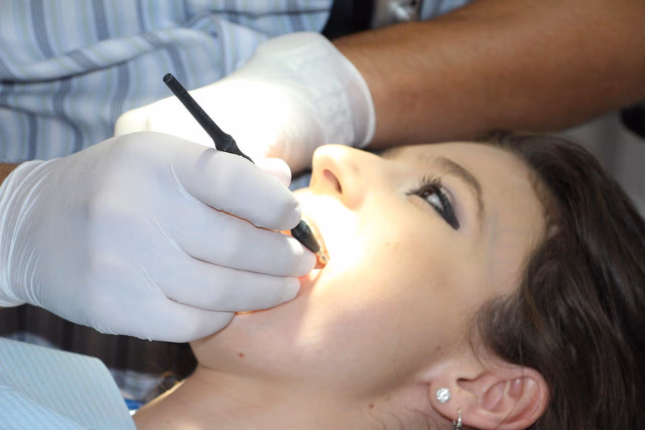 A dentist placing custom porcelain veneers during a comfortable treatment visit