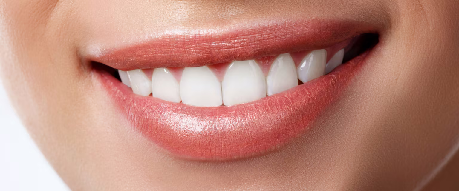 A bright, healthy smile restored with natural-looking dental implants