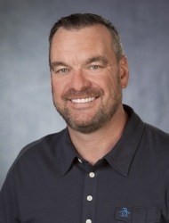 A patient smiling after cosmetic dentistry